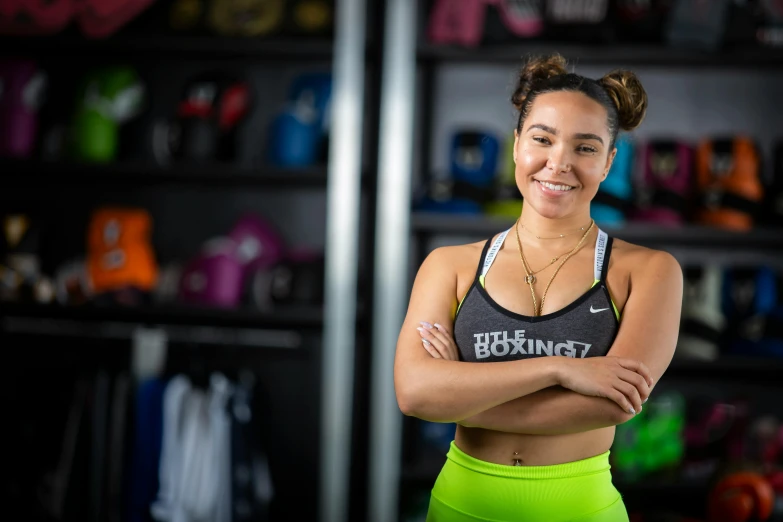 a woman posing for a picture with her arms crossed