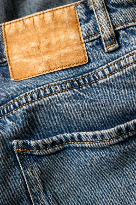 the brown label of a jeans pocket