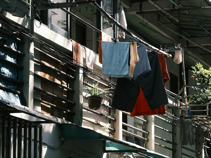 laundry drying on the line outside of an office building