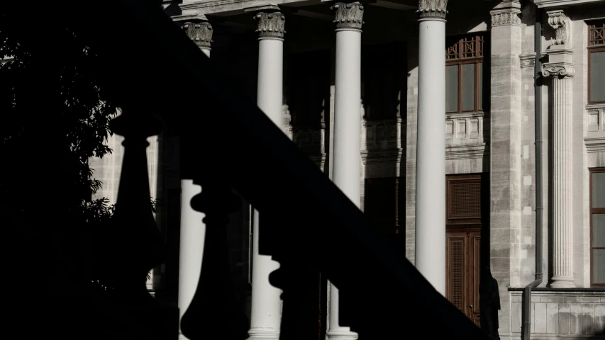 the architectural silhouette of columns of a building