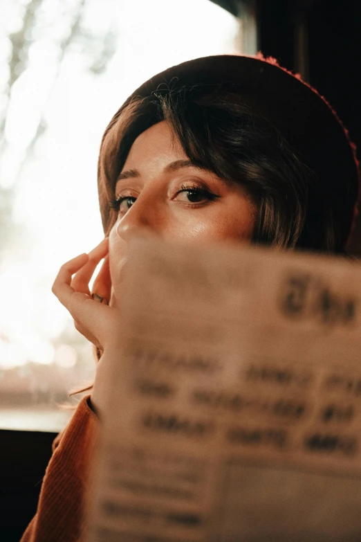 a close - up of a person wearing a headset with a sheet on it