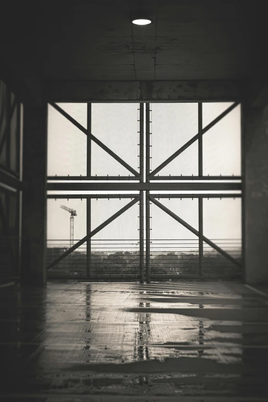 an open door at a warehouse with some water drops