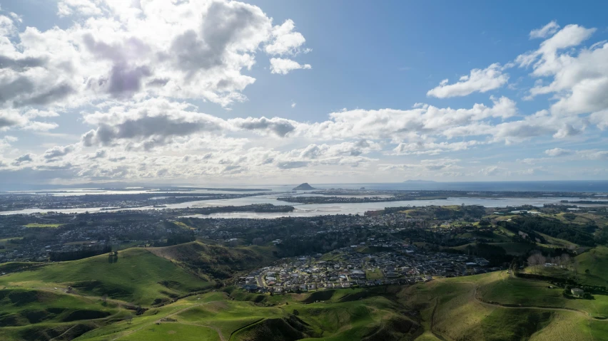 a bird's eye view of a beautiful landscape and water