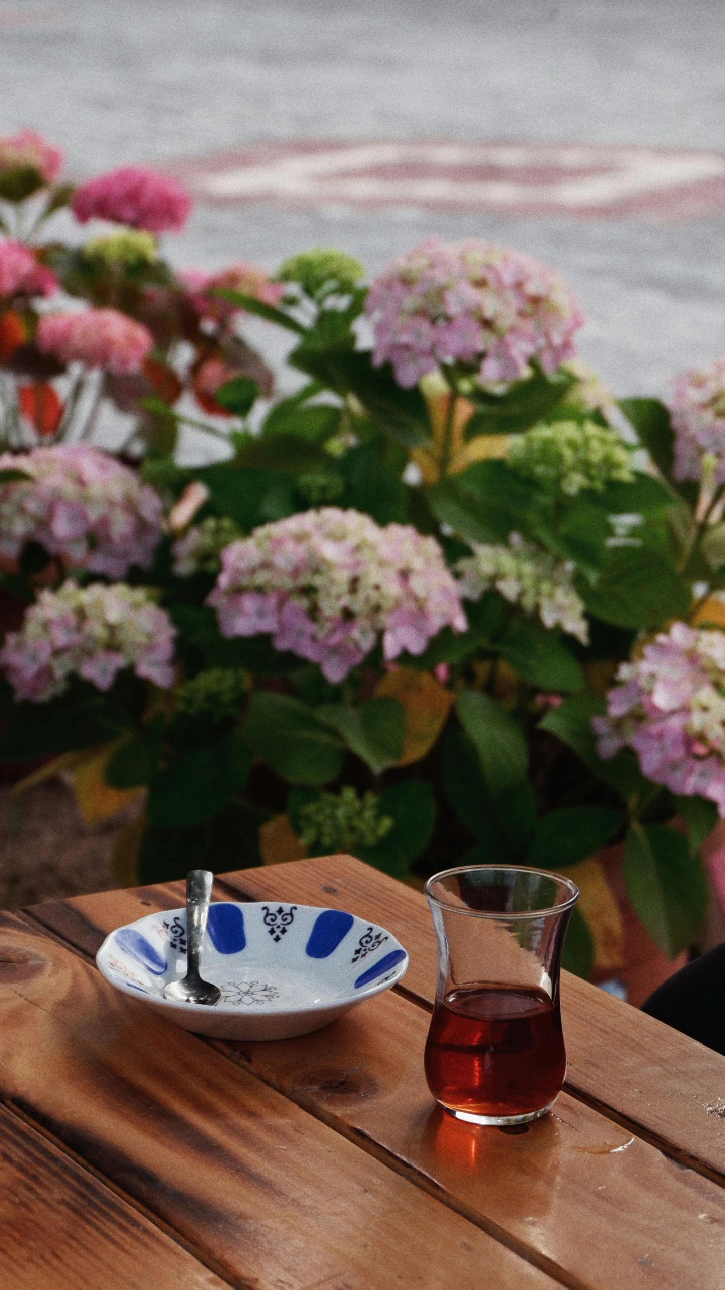 an image of a plate of food and a cup on table