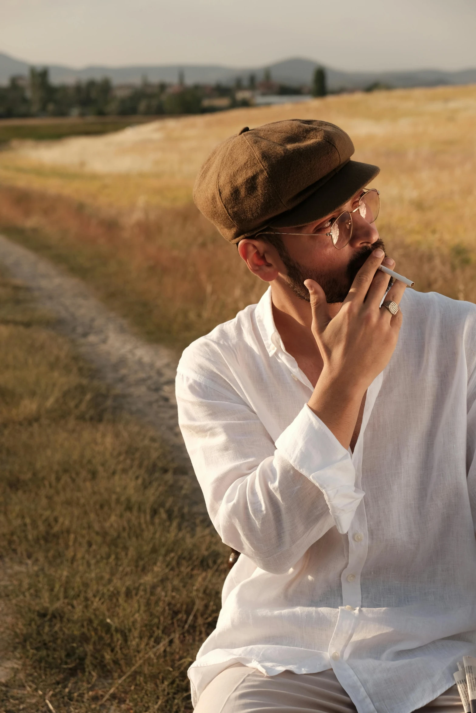 a man with his mouth open while he looks at the ground