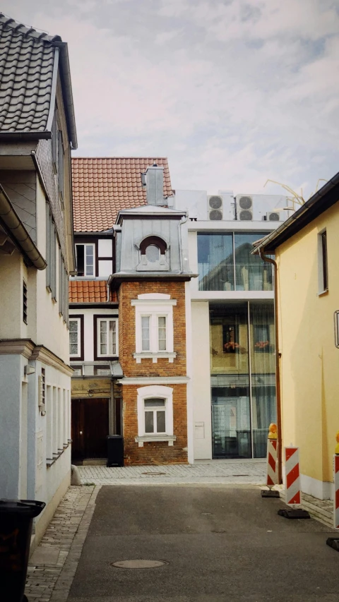 a building with a steeple is near a street