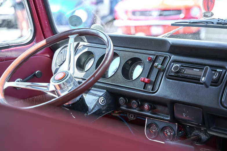 the interior of a vehicle with dashboards and switches