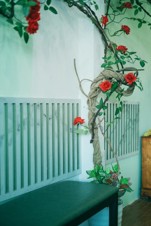 a wall with flowers and vines is decorated on