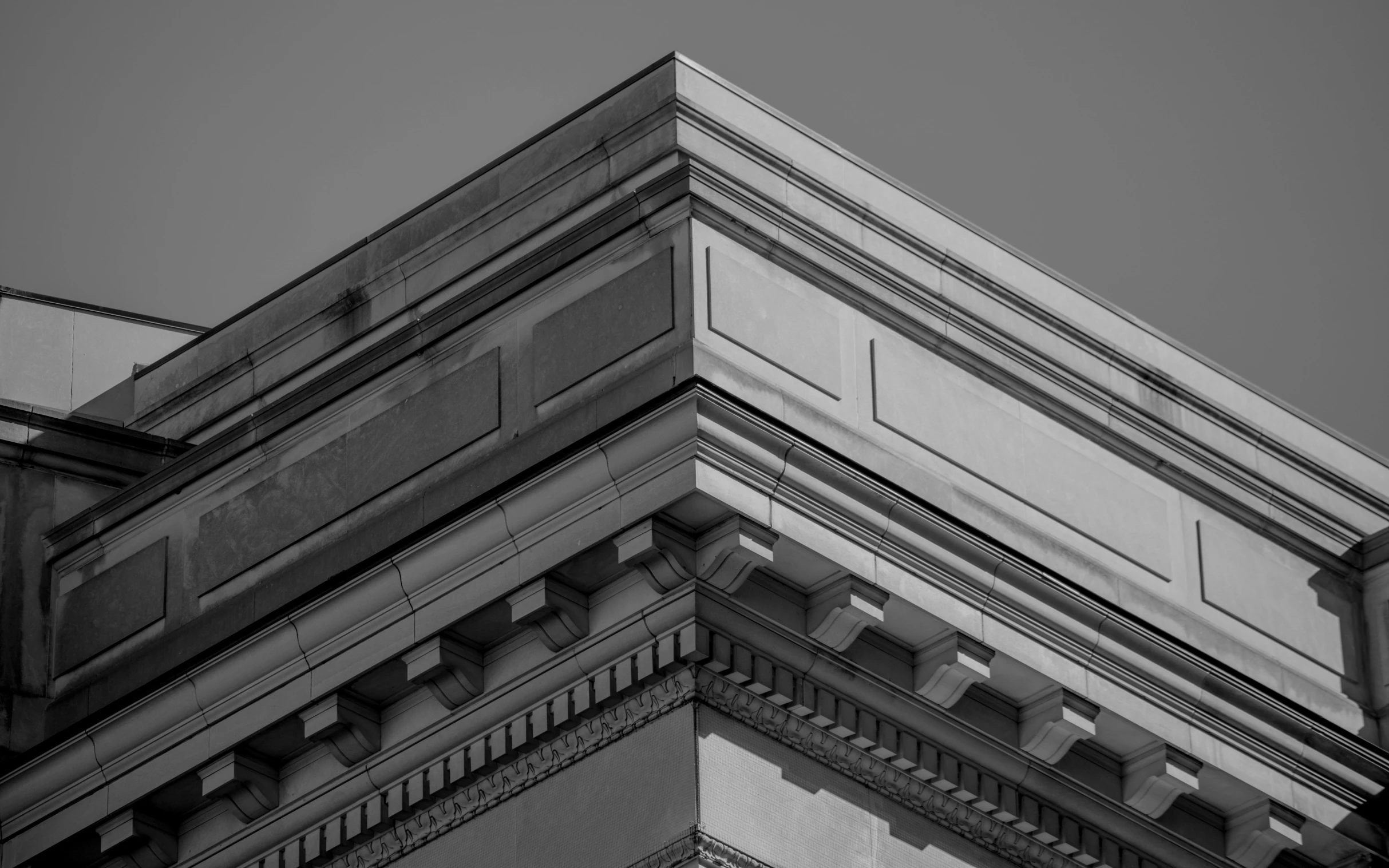 a black and white po of an old building with a large chimney