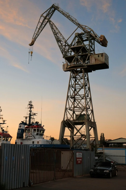 a crane in a yard that is not in use