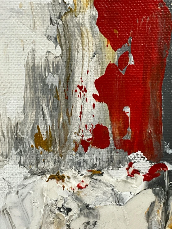 a painting of red and grey paint on paper