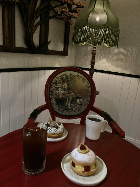 a small table topped with a plate of food