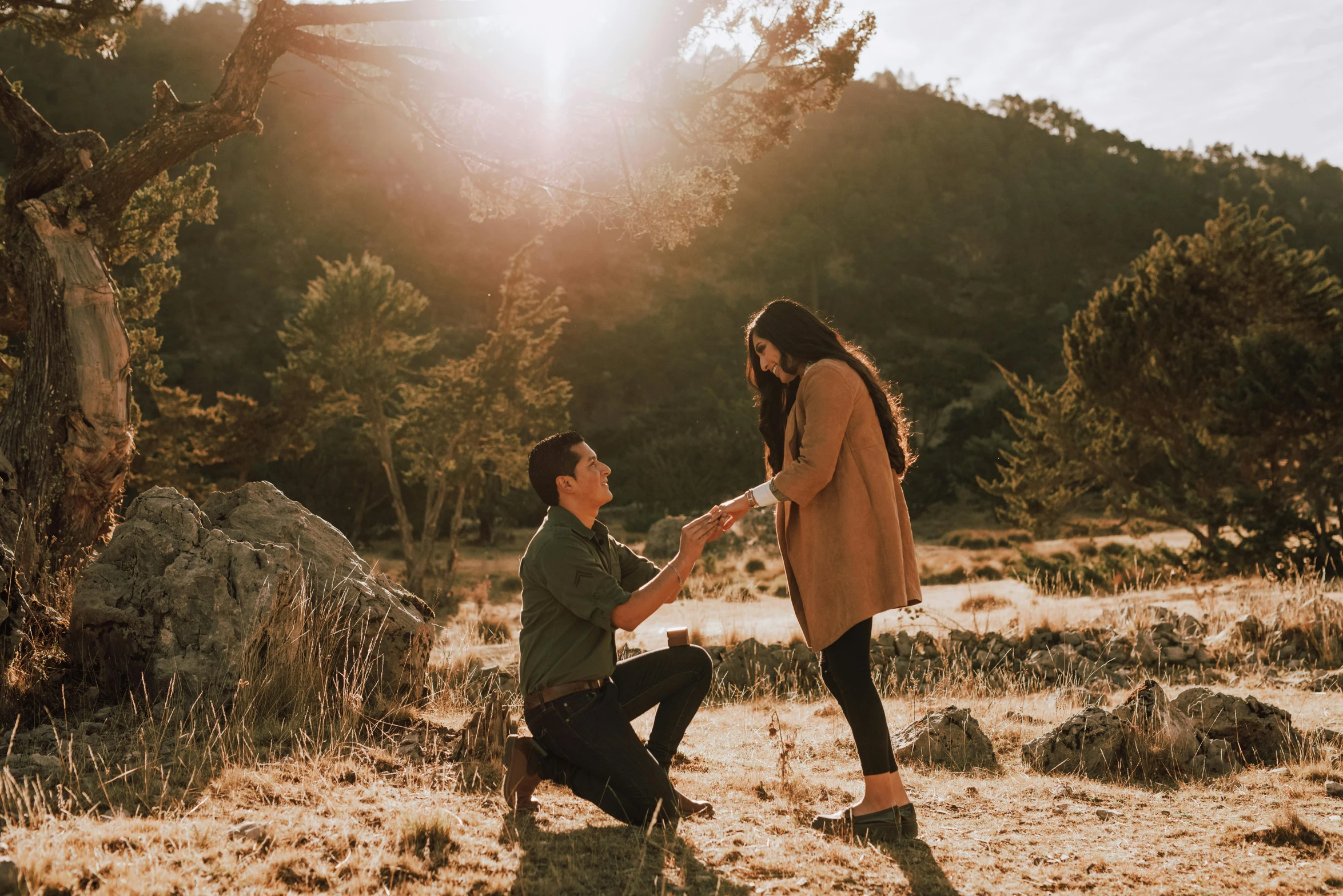 the couple are sharing a moment together in the desert