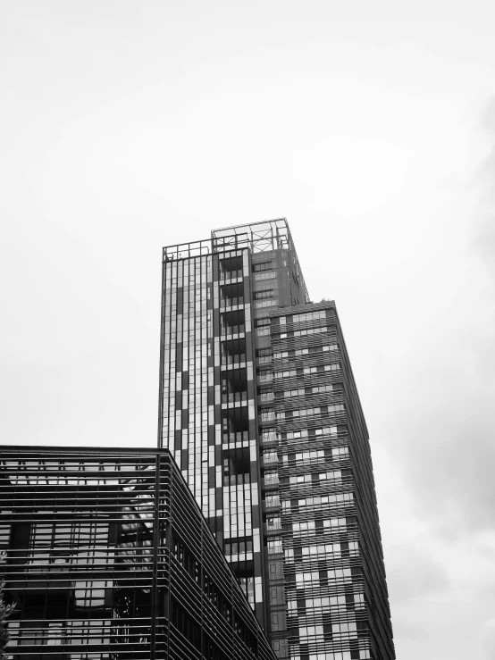 a bird flies around a city next to tall buildings