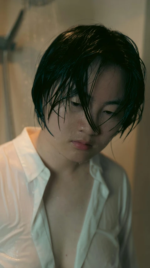 a close up of a person with wet hair