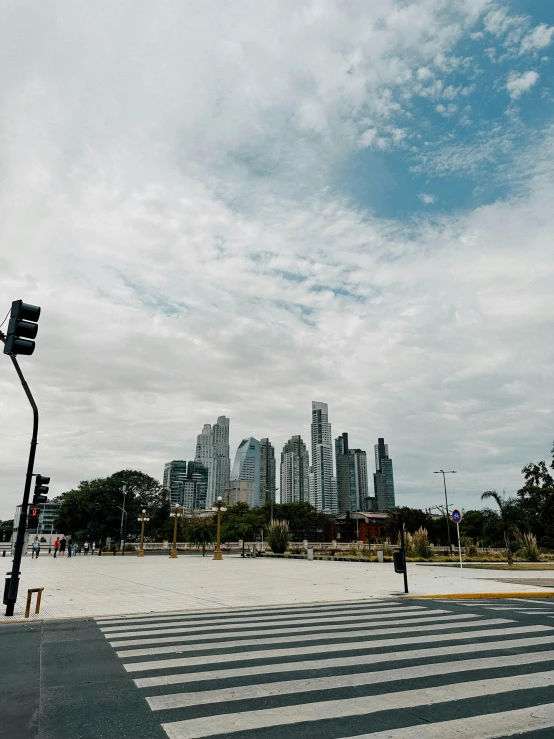 a cloudy sky over the city skyline on a gloomy day