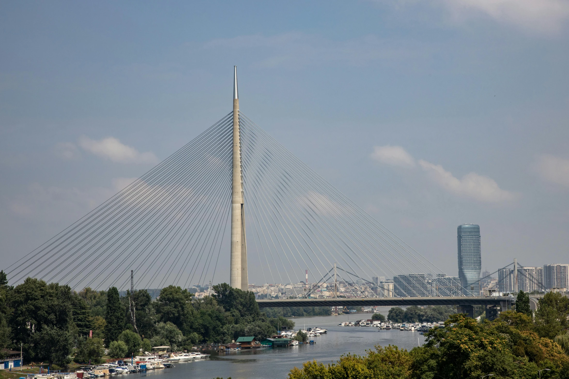 a bridge is on the opposite side of a body of water