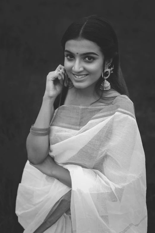 black and white pograph of a woman smiling