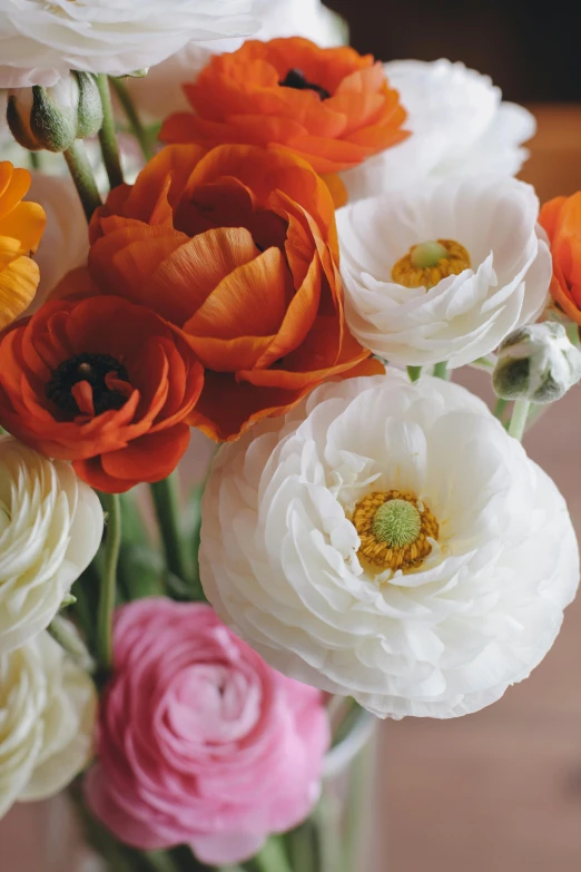 a vase that has some flowers inside of it