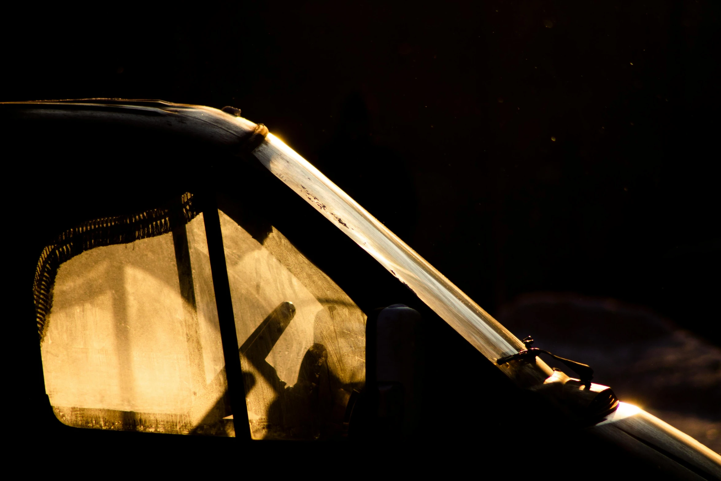 a close up of a street sign in a dark room