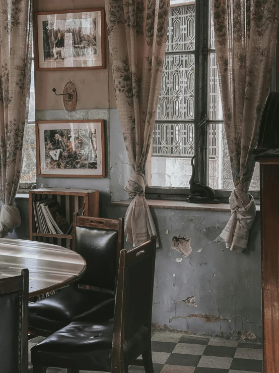 a corner of the room that was occupied by several chairs and one table