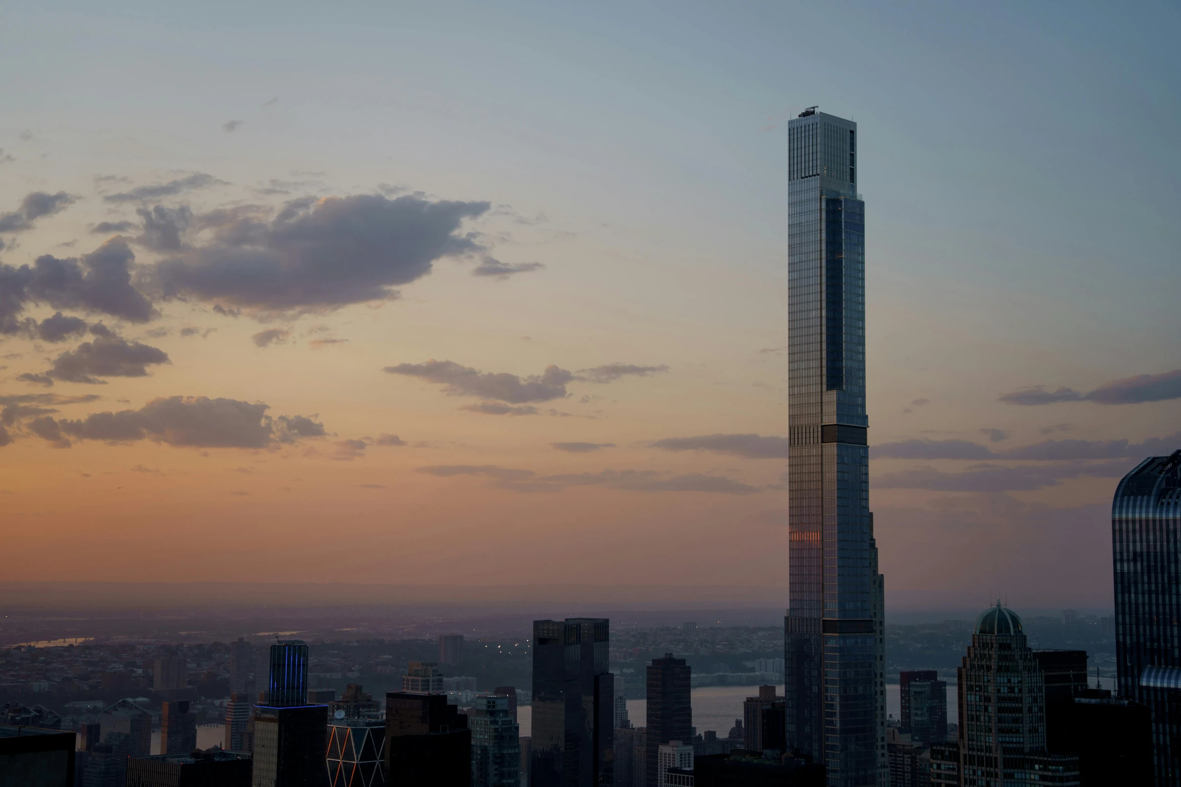 the top of the tower is towering in the background