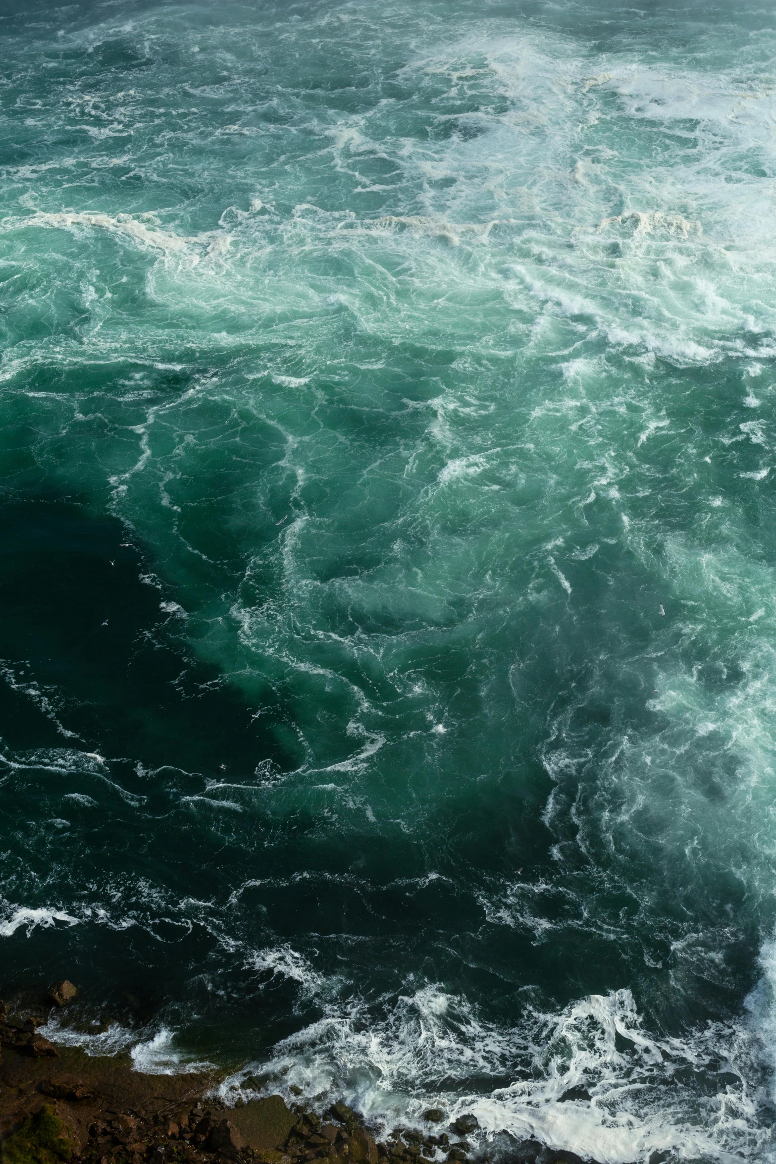 a surfer who is riding in the ocean