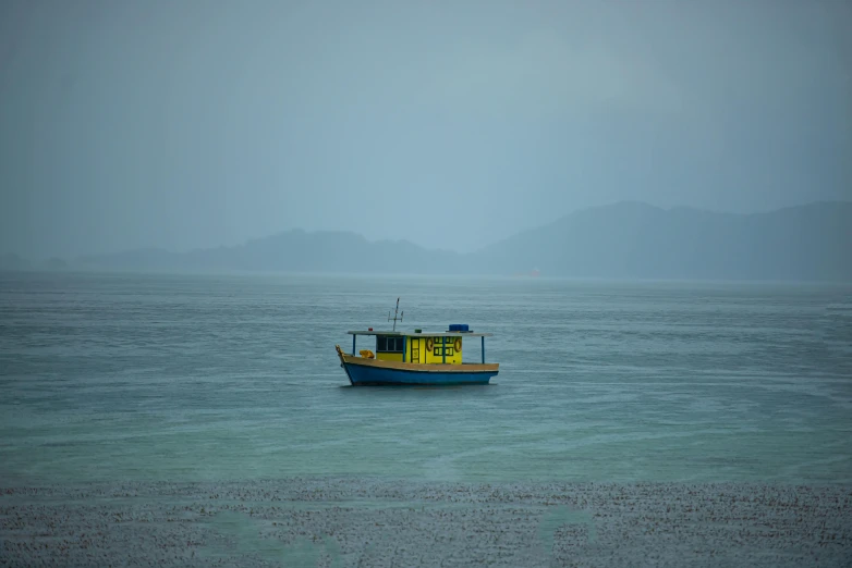 a large blue boat in the middle of the water