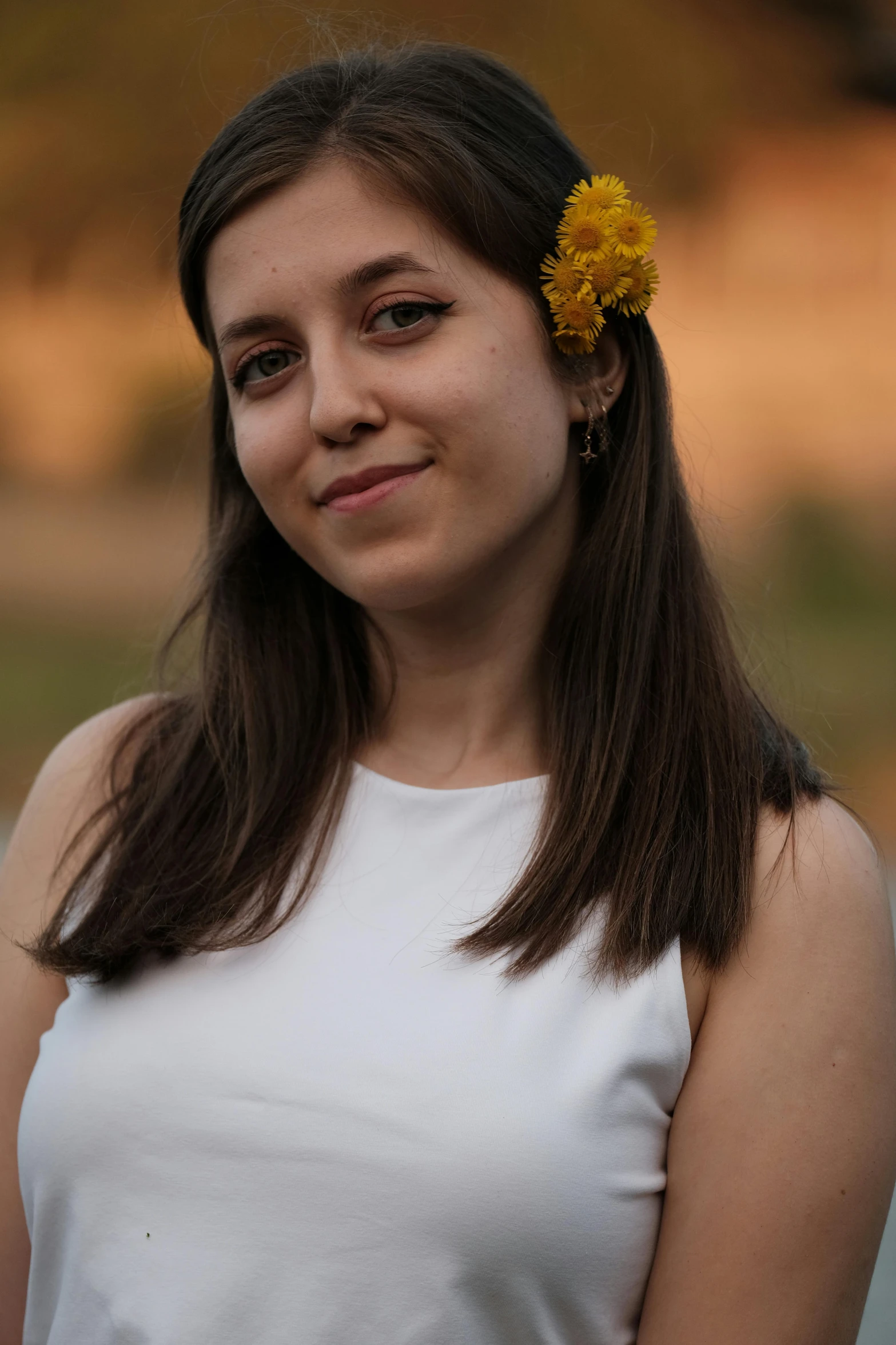 a woman with a flower in her hair