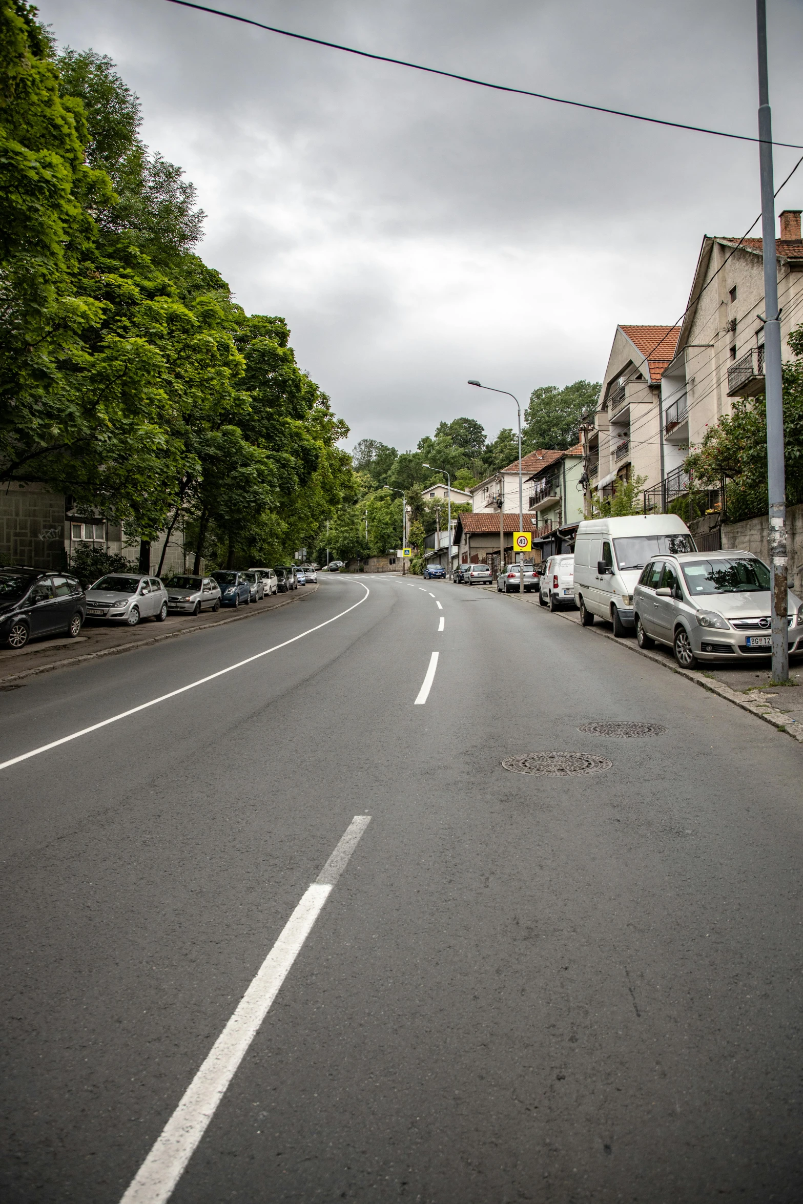 cars line the side of a city street