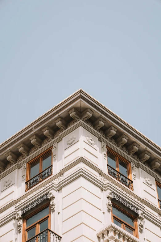 a tall building with many windows on each of it's sides