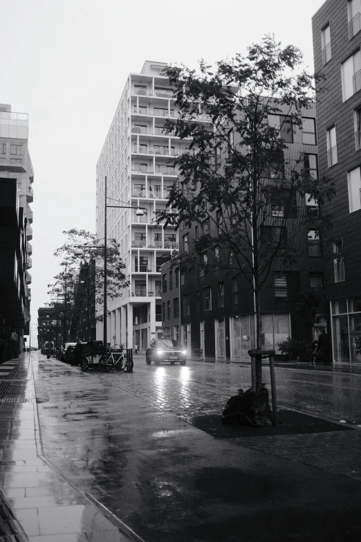 an empty city street with buildings on both sides