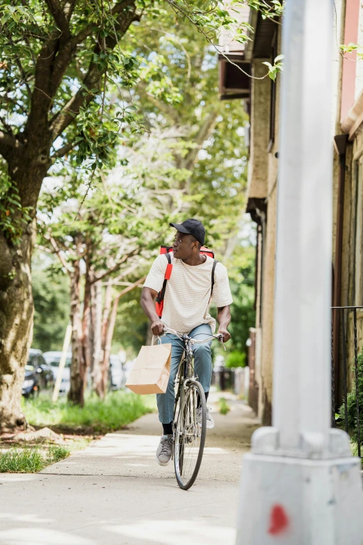 a man rides a bicycle on a street