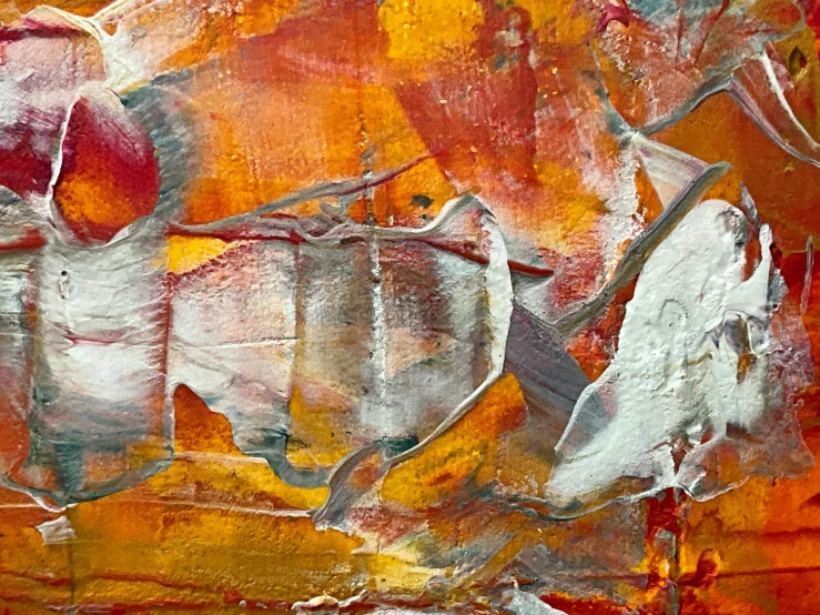 an abstract painting with oranges, reds, browns and white