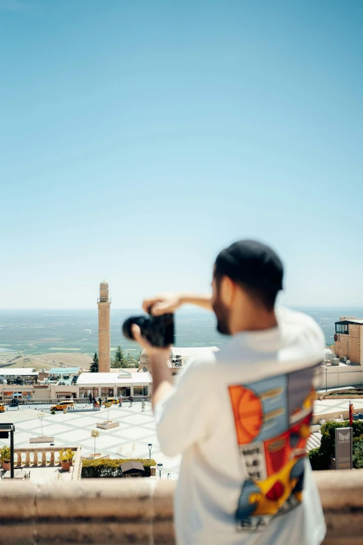 a person taking a picture with a camera