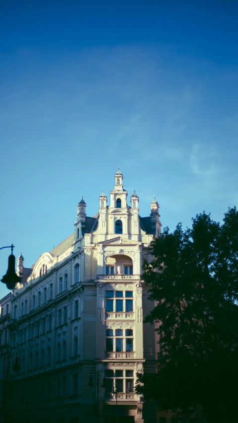 an old building with a clock on the top