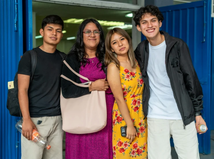 group of people with their friends outside a building