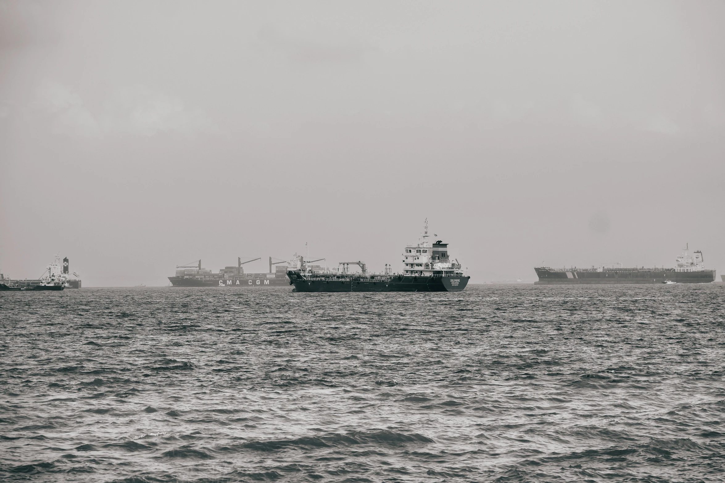 a boat floating on top of the ocean