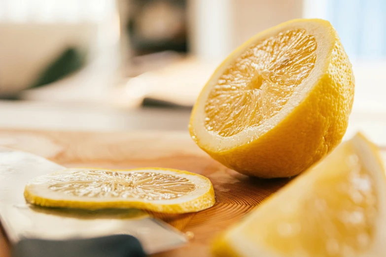 sliced up lemon slices are shown on a  board