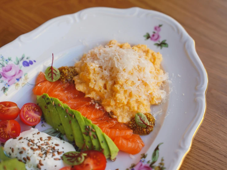 two sushi halves are on a decorative plate