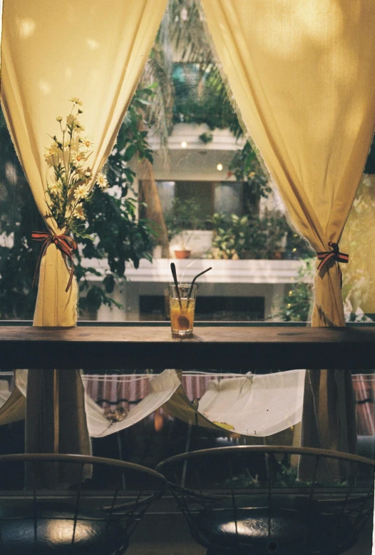 two vases that are sitting on a table