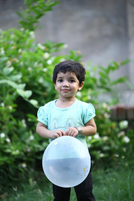 a  holding a frisbee in her hands