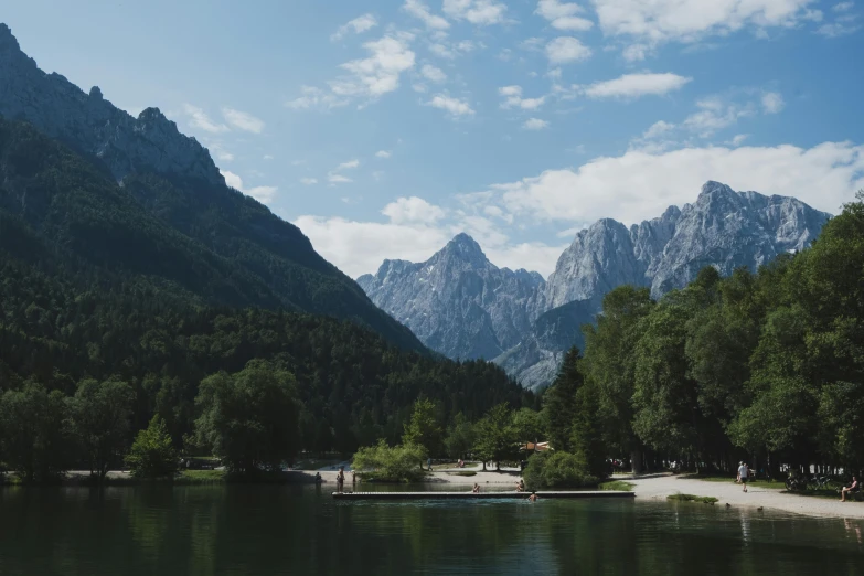 an outdoor picnic is being made on a lake