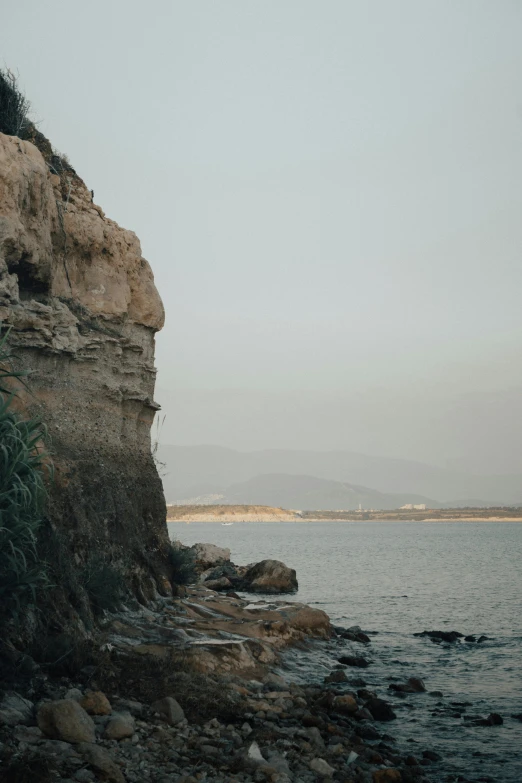 the shore is rocky and low to the water