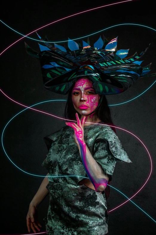 a woman wearing a large headdress with circular lines on her head