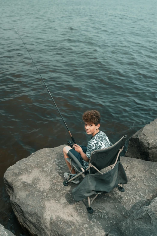 there is a  fishing with a chair