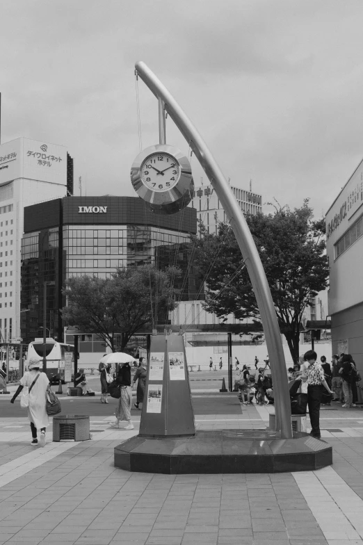 there is a clock in the middle of a street