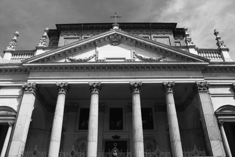 a black and white pograph of columns and arches