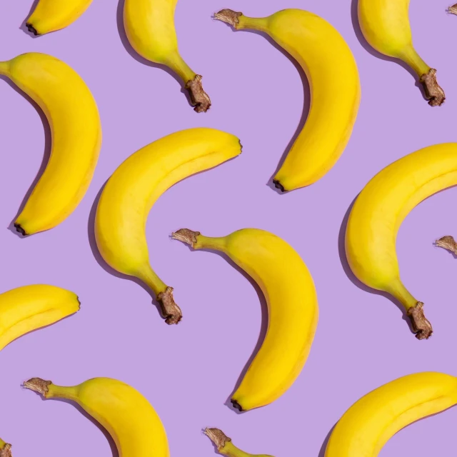 bananas lined up and placed in a grid pattern