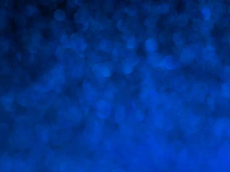 a blue background with small circles